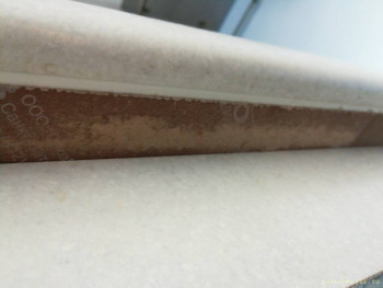 Steam comes out of the dishwasher and damages the countertop and façade. - 16164625540221555547354.jpg